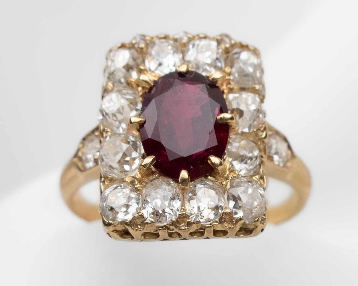 French Imperial Rectangular Ruby & Diamond Halo Ring