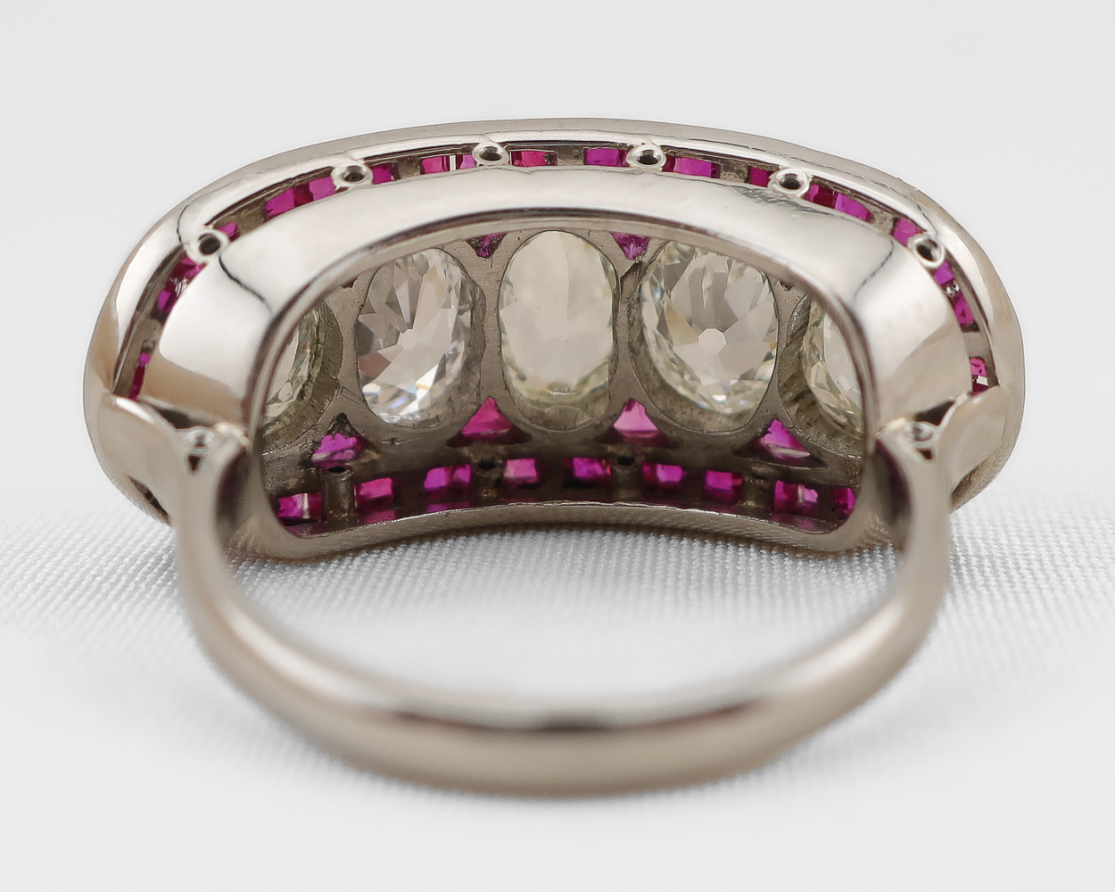 Art Deco 5-Stone Diamond Ring with Ruby Halo