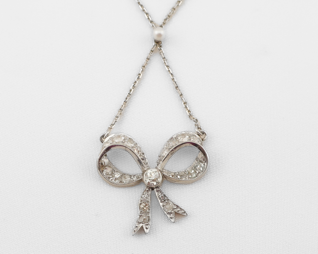 Edwardian Diamond Bow Necklace — Isadoras Antique Jewelry