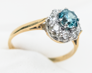 Circa 1975 Blue Zircon & Diamond Halo Ring