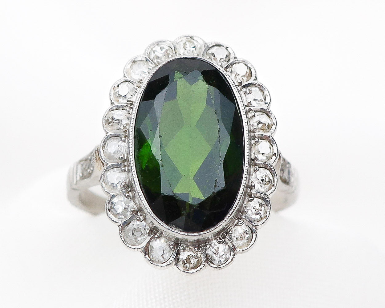 Isadora: Green Oval Emerald Halo Engagement Ring