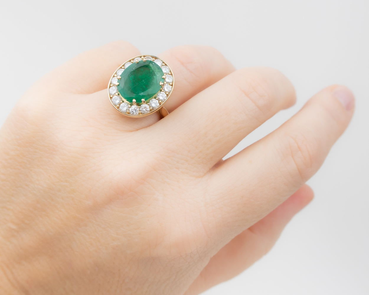 French 1970s Emerald and Diamond Halo Ring